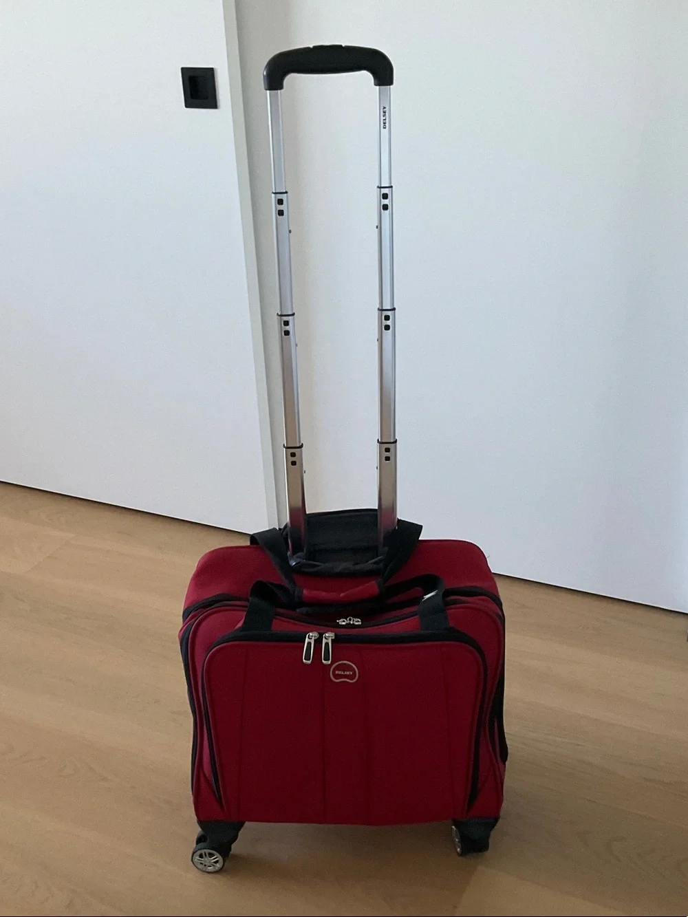 Delsey Red Carry-On 4 wheels Spinner